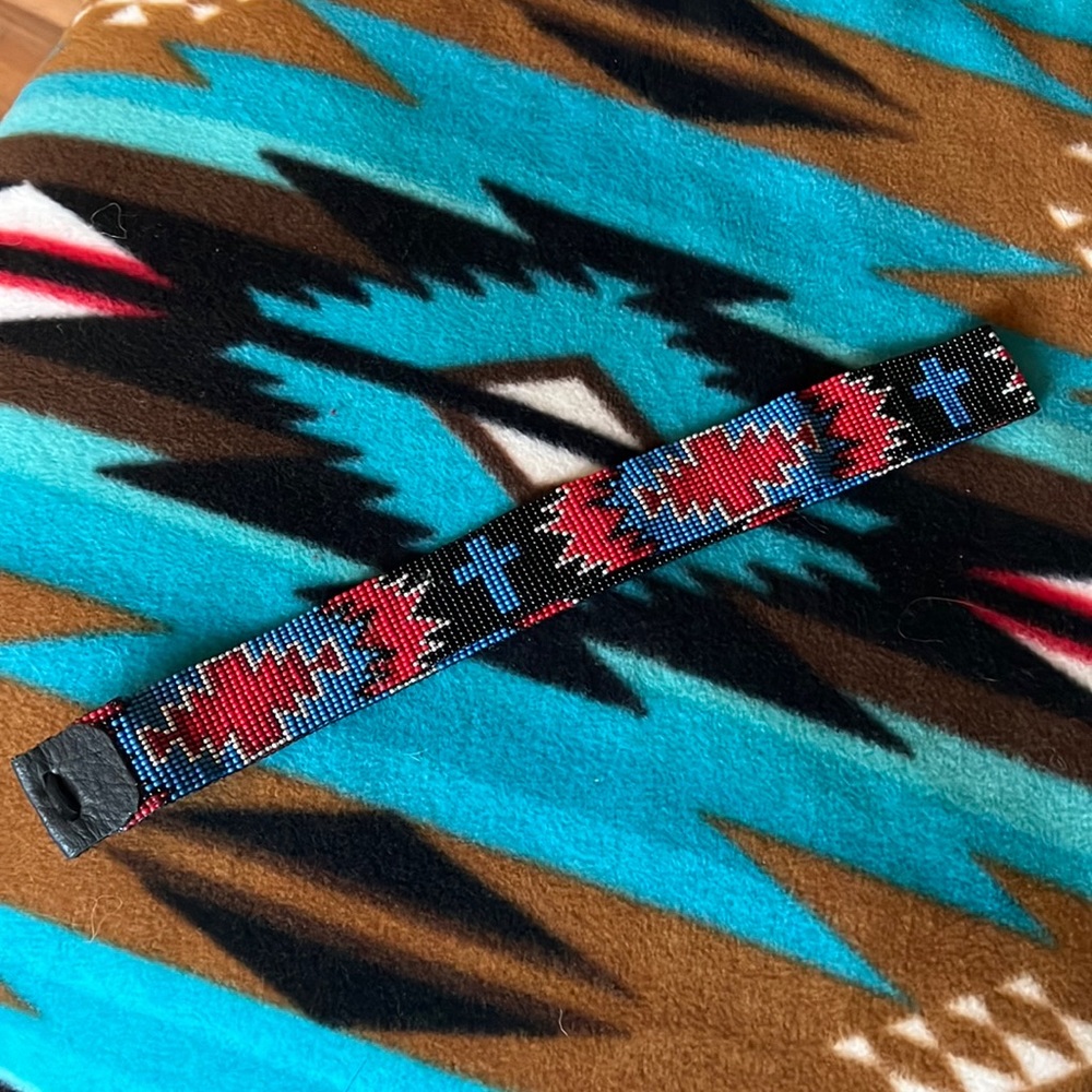 Hand beaded hat band with leather closure